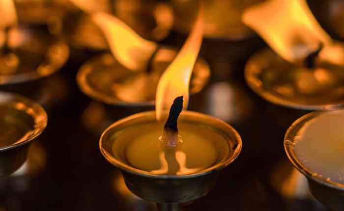 Lighting a ghee lamp every day