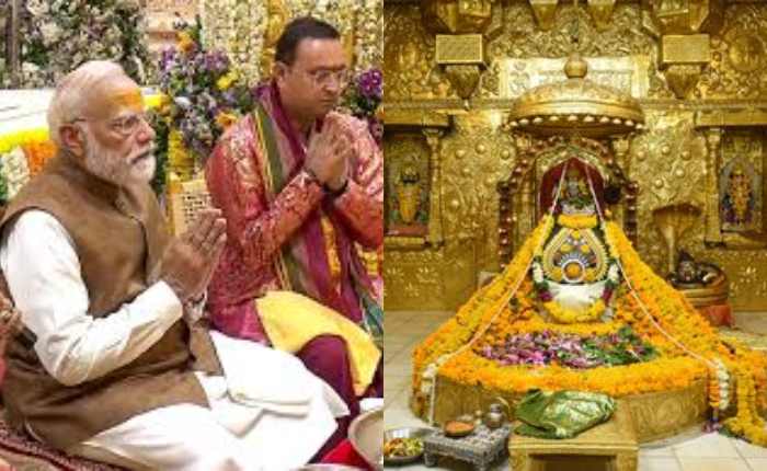 सोमनाथ मंदिर में पूजा-अर्चना करते प्रधानमंत्री नरेंद्र मोदी, आसपास मौजूद श्रद्धालु और सजा हुआ मंदिर परिसर.